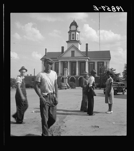 Untitled photo, possibly related to: Courthouse, Pittsboro, North Carolina. Note ever present Confederate States of America monument