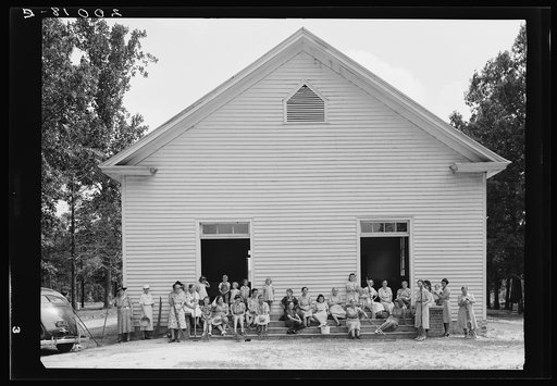 Untitled photo, possibly related to: Women of the congregation of Wheeley's Church on steps with brooms and buckets on annual clean up day. Gordonton, North Carolina