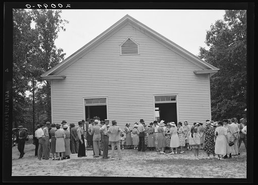 Untitled photo, possibly related to: Congregation gathers in groups to talk after services are over. Wheeley's Church, Person County, North Carolina