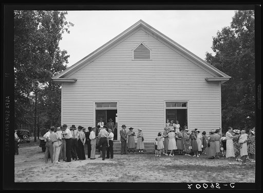 Untitled photo, possibly related to: Congregation gathers in groups to talk after services are over. Wheeley's Church, Person County, North Carolina