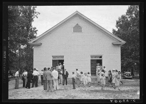 Untitled photo, possibly related to: Congregation gathers in groups to talk after services are over. Wheeley's Church, Person County, North Carolina