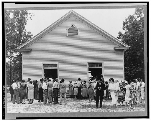 Congregation gathers in groups to talk after services are over. Wheeley's Church, Person County, North Carolina
