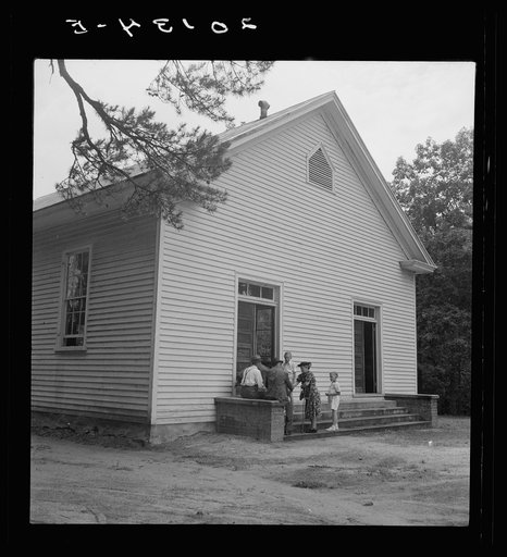 Conversation among members of congregation after services. Wheeley's Church, Gordonton, North Carolina