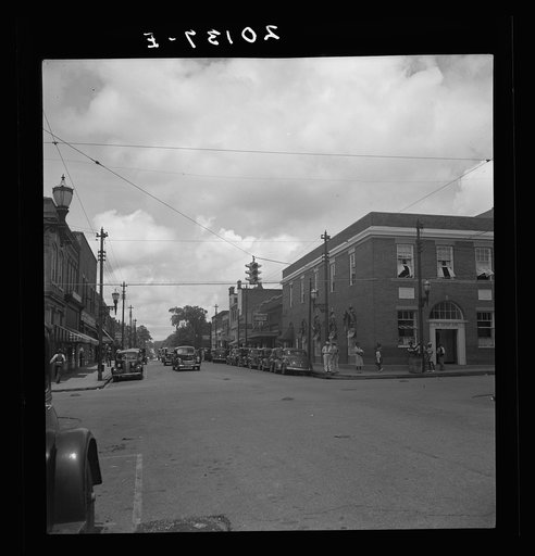 The main street, Fayeteville Street, of Siler City, North Carolina. Contrast with picture of same scene taken twenty five years ago