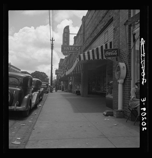 Untitled photo, possibly related to: The main street, Fayeteville Street, of Siler City, North Carolina. Contrast with picture of same scene taken twenty five years ago