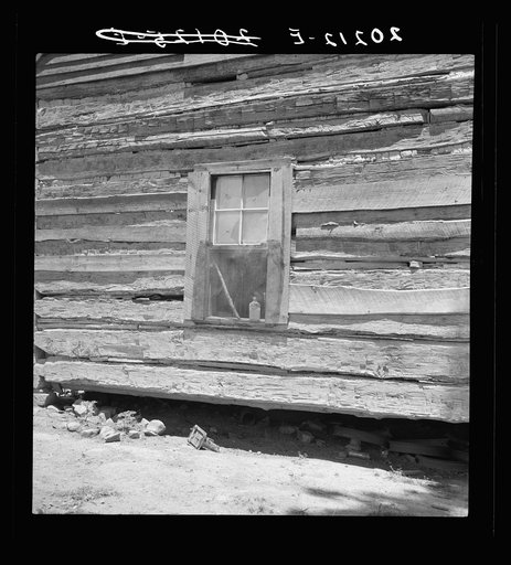 Log house of rural non-farm family. House is over fifty years old. Orange County, North Carolina