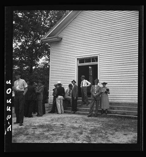 Untitled photo, possibly related to: Congregation entering church. Wheeley's Church. Person County, North Carolina