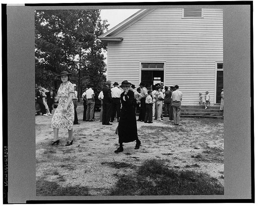 Members of congregation leaving for home after services. Wheeley's Church, Person County, North Carolina