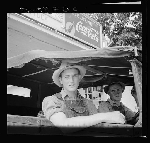 Untitled photo, possibly related to: Young North Carolinian in old Ford. He does not farm. "Works for wages." At Tuck's filling station. Person County, North Carolina