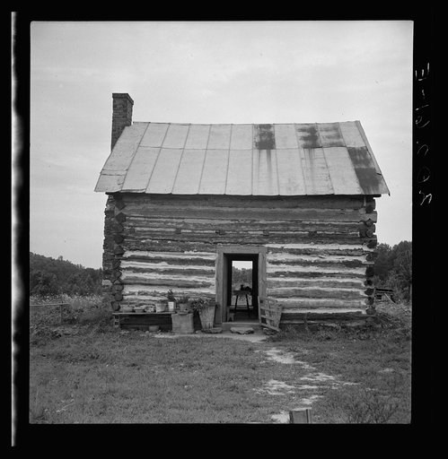 Untitled photo, possibly related to: Young sharecropper and his first child. Hillside Farm. Person County, North Carolina