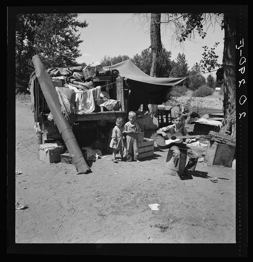 Untitled photo, possibly related to: Migratory children living in "Rambler's Park." They have lived on the road for three years. Nine children in the family. Yakima Valley, Washington