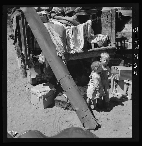 Untitled photo, possibly related to: Migratory children living in "Rambler's Park." They have lived on the road for three years. Nine children in the family. Yakima Valley, Washington