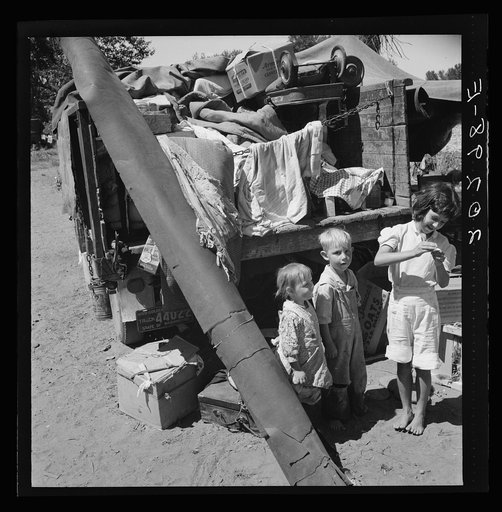 Untitled photo, possibly related to: Migratory children living in "Rambler's Park." They have lived on the road for three years. Nine children in the family. Yakima Valley, Washington