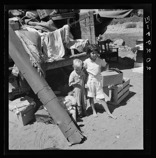 Untitled photo, possibly related to: Migratory children living in "Rambler's Park." They have lived on the road for three years. Nine children in the family. Yakima Valley, Washington