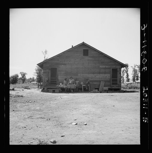 Untitled photo, possibly related to: Home of family living in Sumac Park, shacktown community outside of Yakima, Washington. Father is ill and unable to work. They are paying for land (three hundred and fifty dollars) at rate of seven dollars a month