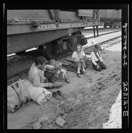 Family who traveled by freight train. Washington, Toppenish, Yakima Valley Toppenish, Yakima Valley, Wash.  Aug. 1939.  Family who traveled by freight train.