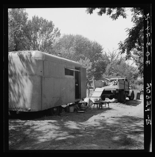 Untitled photo, possibly related to: The house trailer and the youngest little girl. Washington, Yakima Valley, Toppenish