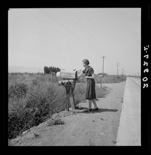 Untitled photo, possibly related to: Mrs. Bouchey gets the morning mail. Wife of tenant purchase client. Washington, Yakima Valley, near Toppenish