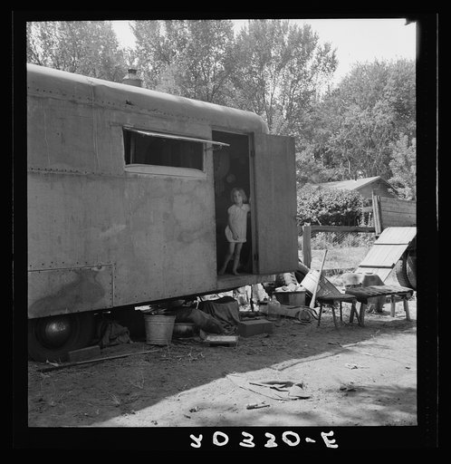 The house trailer and the youngest little girl. Washington, Yakima Valley, Toppenish
