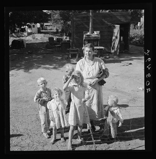 Family living in shacktown community, mostly from Kansas and Missouri. This family has five children, oldest in third grade. Rent seven dollars per month, no plumbing. Husband working on Work Projects Administration wages, forty four dollars