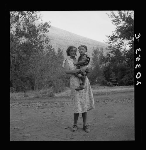 Champion hop picker in squatter camp before the season opens. Earned five dollars a day in the 1938 season. Age twenty three, been on the road seven years. Married. "I think I did pretty well, only have one baby. Want to get out of this living like a dog." Washington, Yakima Valley
