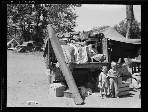 Untitled photo, possibly related to: Migratory children living in "Rambler's Park." They have lived on the road for three years. Nine children in the family. Yakima Valley, Washington