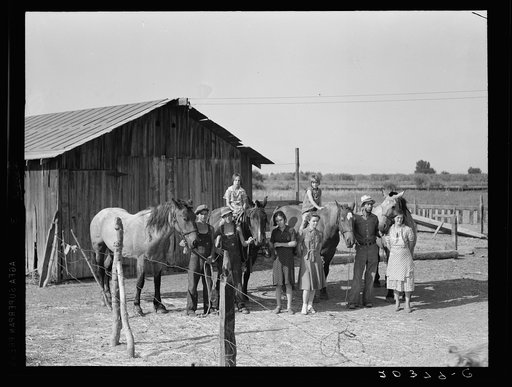 Untitled photo, possibly related to: Chris Adolf, his team, and six of his children on their new farm. Washington, Yakima Valley, near Wapato