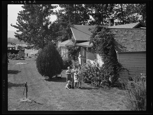 Washington, Yakima Valley, near Wapato. One tenant purchase program (Farm Security Administration) client, Jacob N. Schrock. This family with eight children had lived for twenty-five years on a rocky, rented farm in this valley. They now own forty eight acres of good land, this good house, price six