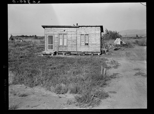 Washington, Yakima. Homes are built bit by bit with whatever materials are available. Many drought refugees settle in Sumac Park, one of several large shacktowns around Yakima