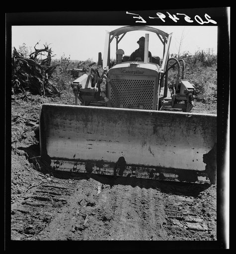Western Washington, Lewis County, near Vader. Bulldozer equipped with grader type blade. Nieman farm. General caption number 41