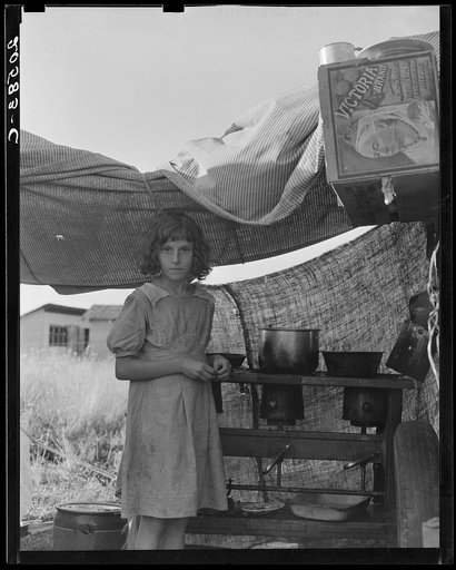 Migratory child at end of day in bean pickers' camp near West Stayton, Oregon. See general caption number 46