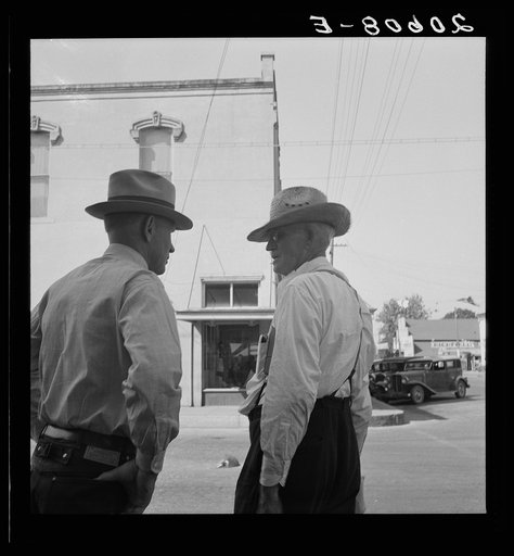 Untitled photo, possibly related to: Williamette Valley hop farmers in town hold their political forum on drug store corner. Independence, Oregon