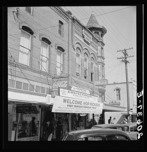 Street corner, Williamette Valley. Small town during hop season. Independence, Polk County, Oregon