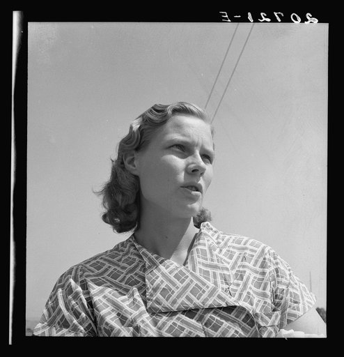 Oregon, Klamath County, Merrill. Young woman from a South Dakota farm, where her family still lives. She and her husband are migratory laborers and live in a shack in Klamath County waiting for potato harvest to open. "My husband just day labors."