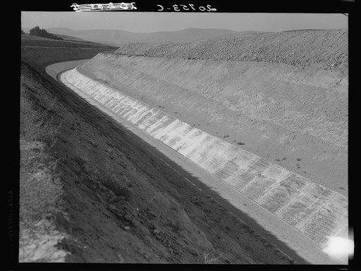 Washington, Yakima County, Roza Irrigation Canal. Sides concrete, lined by machine. The project, when complete in 1945, will open 72,000 acres to cultivation in East Yakima and West Benton Counties