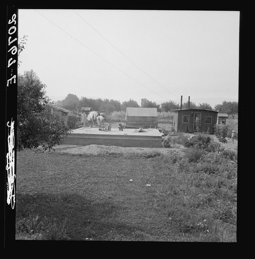 Untitled photo, possibly related to: Washington, near Yakima. Close-up of present dwelling from which family will move into basement house