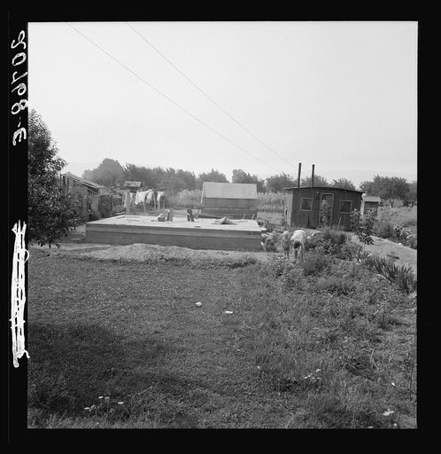 Untitled photo, possibly related to: Washington, near Yakima. Close-up of present dwelling from which family will move into basement house