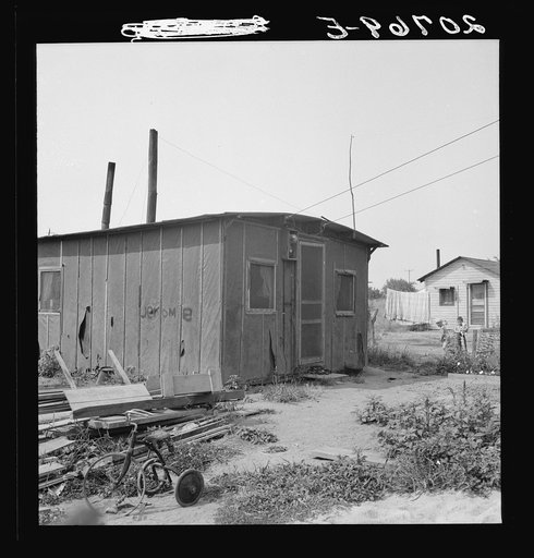 Washington, near Yakima. Close-up of present dwelling from which family will move into basement house
