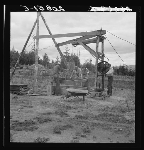 Kytta family, Farm Security Administration (FSA) borrowers on non-commercial experiment, build a well. Michigan Hill, Thurston County, western Washington. See general caption number 36