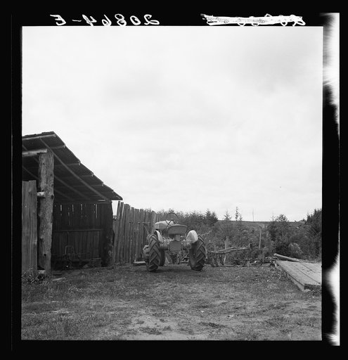 Arnold yard. The tractor was purchased under Farm Security Administration (FSA) loan. Michigan Hill, Thurston County, western Washington
