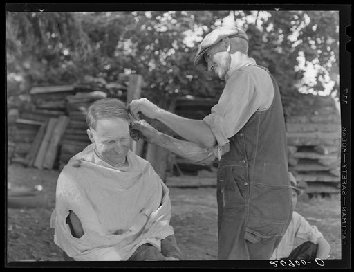 Untitled photo, possibly related to: Bean pickers barbering each other. Near West Staten, Marion County, Oregon. See general caption number 46