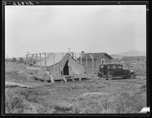 Family living in tent while building the house around them. Near Klamath Falls, Klamath county, Oregon. See general caption number 47