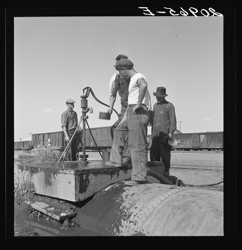 Untitled photo, possibly related to: Drinking water for the whole town, also for the migrant camp across the road. Tulelake, Siskiyou County, California. See caption numbers 63-1 and 44