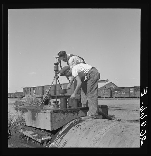 Untitled photo, possibly related to: Drinking water for the whole town, also for the migrant camp across the road. Tulelake, Siskiyou County, California. See caption numbers 63-1 and 44