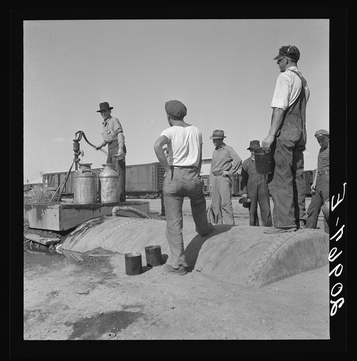 Drinking water for the whole town, also for the migrant camp across the road. Tulelake, Siskiyou County, California. See caption numbers 63-1 and 44