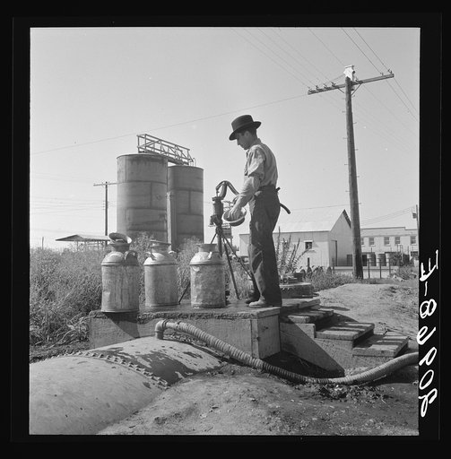 Untitled photo, possibly related to: Drinking water for the whole town, also for the migrant camp across the road. Tulelake, Siskiyou County, California. See caption numbers 63-1 and 44