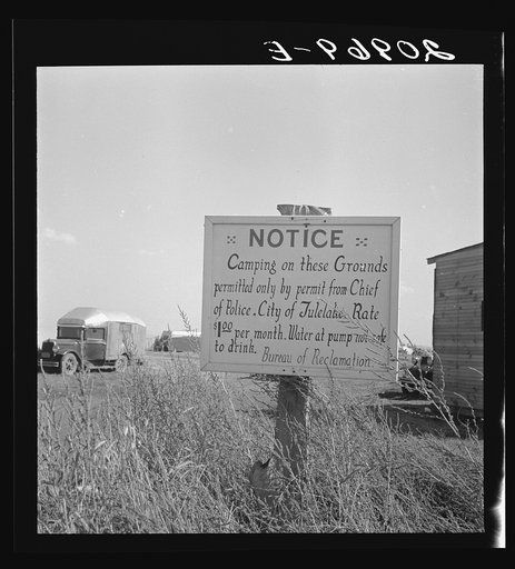 Sign on camp site opposite potato packing sheds. Tulelake, Siskiyou County, California. General caption number 63-1
