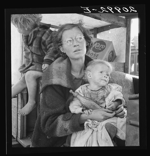 Family, one month from South Dakota, now on the road in California. Tulelake, Siskiyou County, California. See general caption number 65