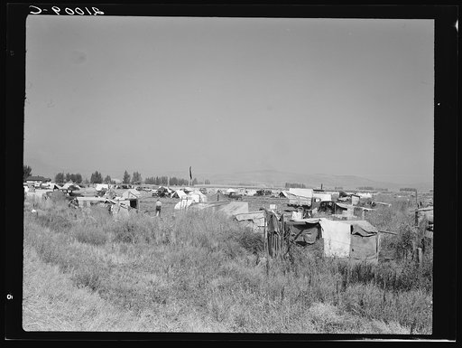 Untitled photo, possibly related to: Families camped on flat before season opens, waiting for the Farm Security Administration (FSA) mobile unit to open. No sanitation, no water. Near Merrill, Klamath County, Oregon