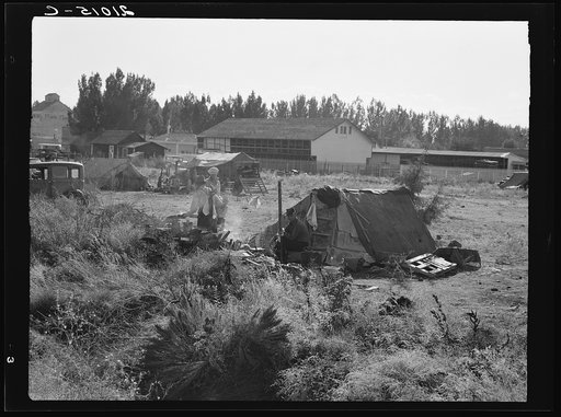 Untitled photo, possibly related to: One of the forty potato camps in open field, entering town. Malin, Klamath County, Oregon. General caption number 64